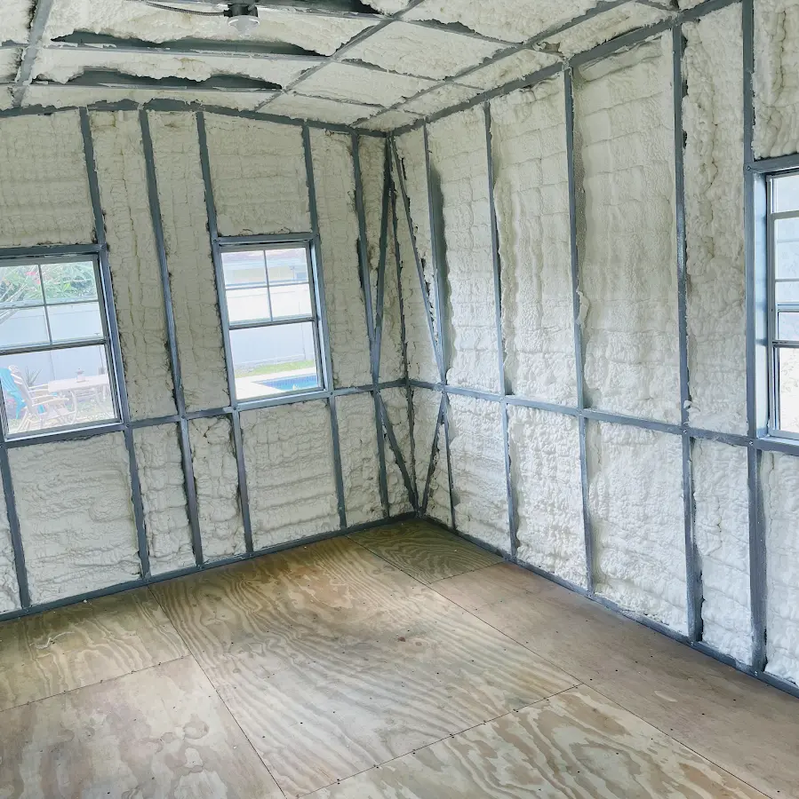 Closed-cell spray foam insulation applied to wall cavities in a residential project in Pleasant Grove